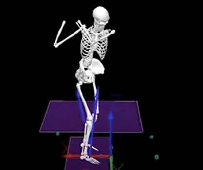 image of a skeleton with golf swing stance