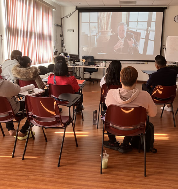 students watching video on a projector